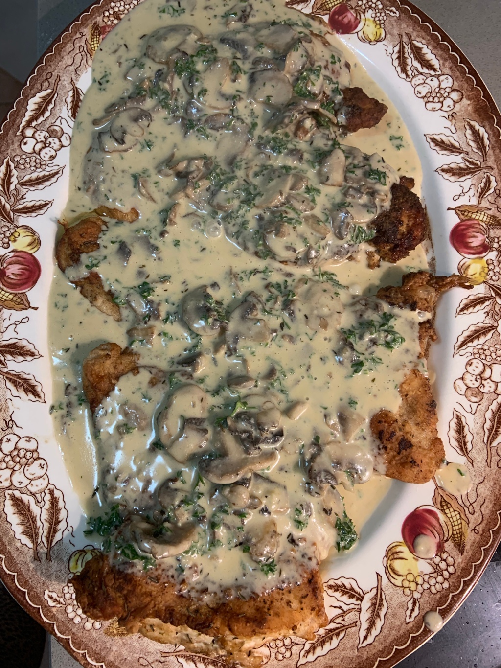 Pounded chicken breasts with mushroom sauce
